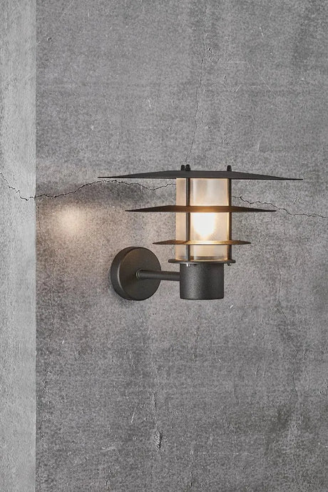 Zwarte wandlamp met E27 fitting Nordlux Bastia 35 - FOIR