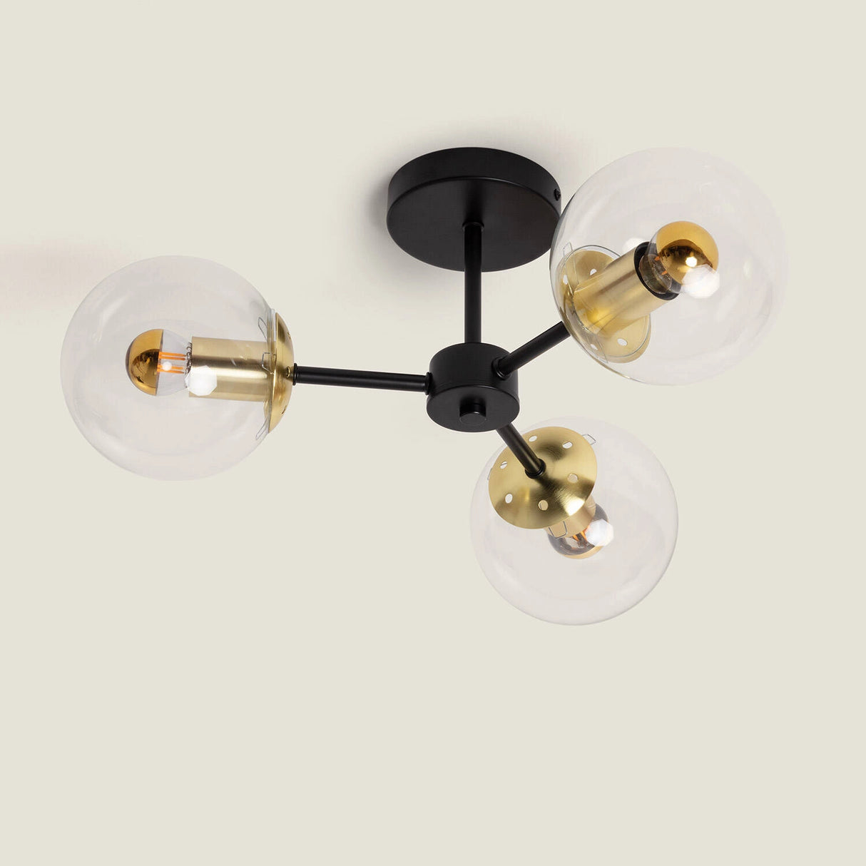 Pafondlamp zwart goud met glazen bollen
